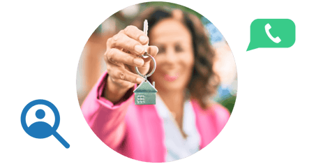 A real estate agent holding property keys after finding and contacting a property owner